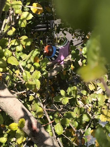 213_small-ceramic-bird-in-tree