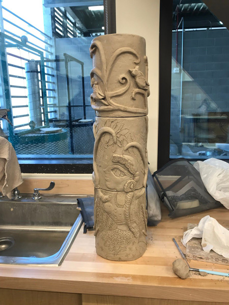 222_clay-totem-pole-parts-vines-and-a-woman